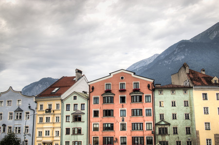 Facades of houses in the typical Austrian building style in Innsbruck, Austriaの写真素材