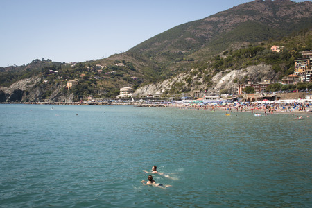 LEVANTO, ITALY - JULY 2016: People on the beach of the cosy town Levanto in the Liguria area in Italyのeditorial素材