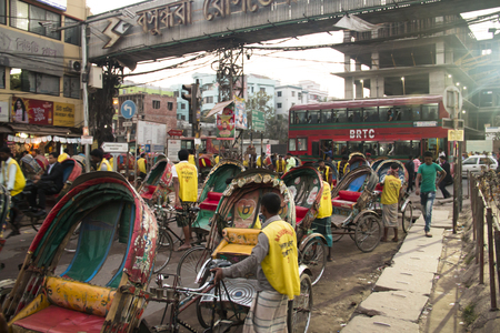 DHAKA, BANGLADESH - FEBRUARY 2017: Street with many vehicles in the center of Dhaka in Bangladesh