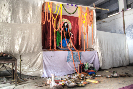 A small hindu altar in a made up temple in an old school in Chittagong, Bangladeshの写真素材