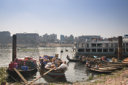 DHAKA, BANGLADESH - FEBRUARY 2017: View over the river with many boats in Sadarghat, the old center of Dhaka in Bangladeshのeditorial素材