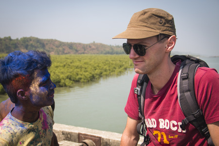 MAHESKHALI, BANGLADESH - FEBRUARY 2017: Children covered in paint during a Hindu festival on Maheskhali Island, Bangladeshのeditorial素材