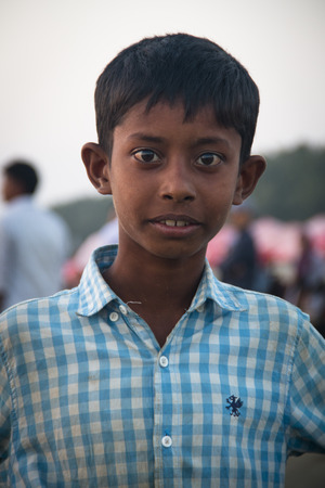 COX'S BAZAR, BANGLADESH - FEBRUARY 2017: Boy on the longest beach in the world in Cox's Bazar in Bangladeshのeditorial素材