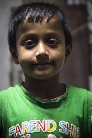 KHULNA, BANGLADESH - FEBRUARY 2017: Boy in the street of Khulna at the edge of the Sundarbans in Bangladeshのeditorial素材