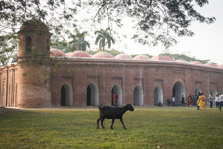 BAGERHAT, BANGLADESH - FEBRUARY 2017: Shait Gumbad Mosque in Bagerhat, Bangladesh, built in 1459 by Khan Jahan Ali. This mosque is also called the 60 dome mosqueのeditorial素材