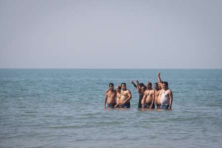 SAINT MARTIN'S ISLAND, BANGLADESH - FEBRUARY 2017: People on the longest beach in the world in Cox's Bazar in Bangladeshのeditorial素材