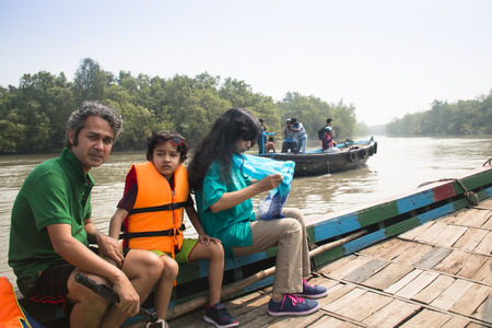 SUNDARBANS, BANGLADESH - FEBRUARY 2017: Film crew on a smal boat on a river in Sundarbans in Bangladeshのeditorial素材