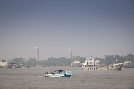 KHULNA, BANGLADESH - FEBRUARY 2017: Boats on the river in Khulna at the edge of the Sundarbans in Bangladeshのeditorial素材