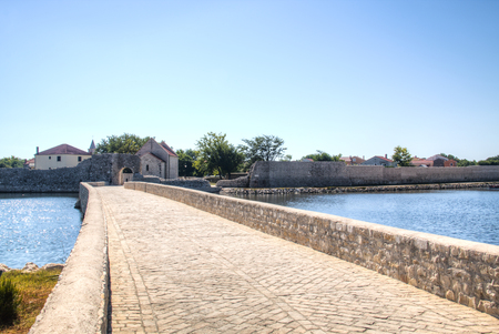 The bridge to the old town center of Nin in Croatiaの写真素材