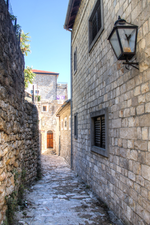 The picturesque narrow streets of the old town of Ulcinj in Montenegroの写真素材
