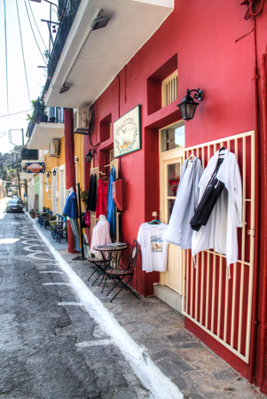 KORONI, GREECE - SEPTEMBER 2017: A typical street with historical houses and tourist shops in koroni, Messinia, Greeceのeditorial素材
