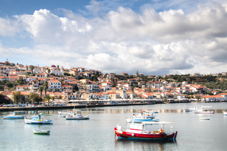 View over the bay with crystal clear water and typical houses in Koroni, Messinia, Greeceのeditorial素材