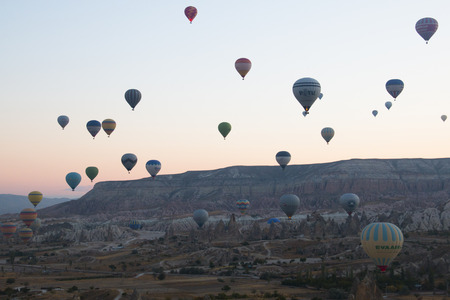 GOREME, TURKEY - OCTOBER 2017: Many hot air balloons fly every morning with tourists over Cappadocia in Turkeyのeditorial素材