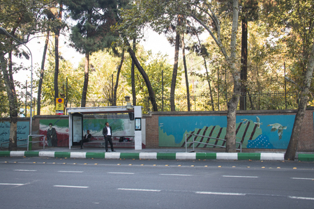 TEHRAN, IRAN – NOVEMBER 2017: Anti America propaganda at the former USA embassy in Tehran, the...