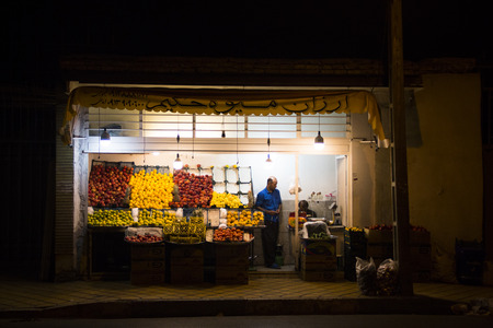ISFAHAN, IRAN  NOVEMBER 2017: Shop with groceries like vegetables and fruits by night in the centre of Isfahan in Iranのeditorial素材