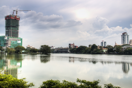 COLOMBO, SRI LANKA - DECEMBER 2017: Pond with skyscrapers in the center of Colombo, the capital of Sri Lankaのeditorial素材