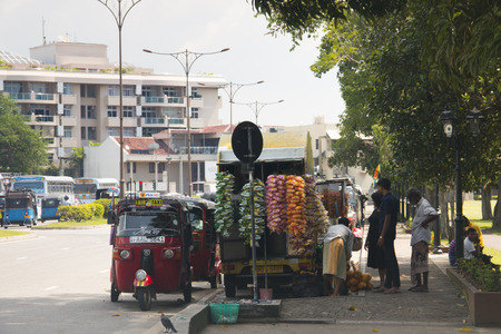 COLOMBO, SRI LANKA - DECEMBER 2017: Street view in Colombo, the capital of Sri Lanka with different types of local trafficのeditorial素材