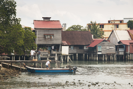 GEORGETOWN, SRI LANKA - DECEMBER 2017: Houses on poles in the streets of the old center of Georgetown in Penang, Malaysiaのeditorial素材