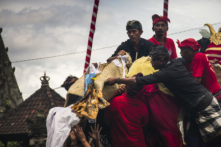 UBUD, BALI - JANUARY 2018: A funeral and cremation ceremony in a little  village near Ubud on Bali island in Indonesiaのeditorial素材