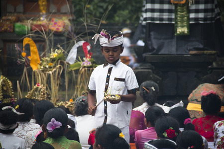 SIDEMEN, BALI - JANUARY 2018: A Hindu ceremony with offerings and many visitors in Bali, the most touristic island of Indonesiaのeditorial素材