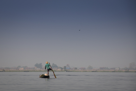INLE LAKE, MYANMAR: Typical fishermen on Inle Lake, one of the top tourist attractions of Myanmarの写真素材