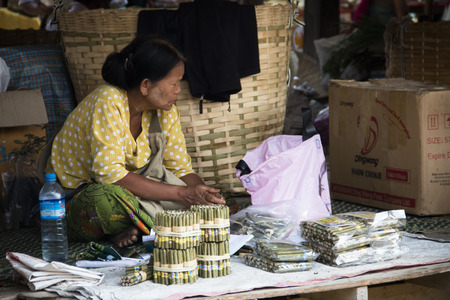 INLE LAKE, MYANMAR â APRIL 2018: People at a market near Inle Lake, one of the top tourist attractions of Myanmarのeditorial素材