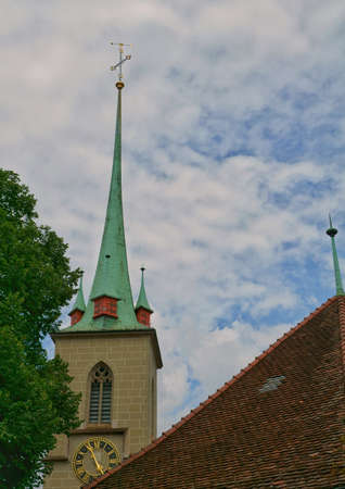 the beautiful architecture and design of the buildings and streets of the old town in bern, switzerlandの写真素材