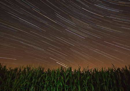 Beautiful long exposure. Star trails time-lapse of the summer nights, at the Bahnstadt in Heidelberg, Germanyの写真素材