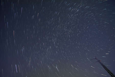 Beautiful long exposure. Star trails time-lapse of the summer nights, at the Bahnstadt in Heidelberg, Germanyの写真素材