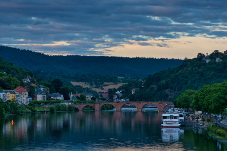 view of the Neckar river and the old bridge ( AltebrÃ¼cke ) in Heidelberg, germanyの写真素材