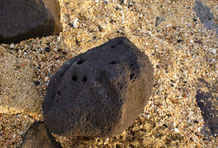 Rocks by the red sea coastline, in Jeddah, Saudi Arabiaの写真素材
