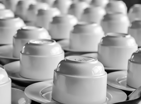 Several coffee cups on a  coffee break tableの写真素材