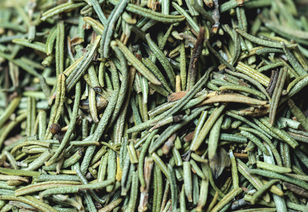 Dried rosemary leaves top view.の写真素材