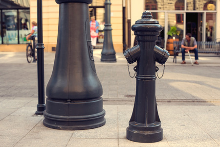 old fireplug on the street .の写真素材