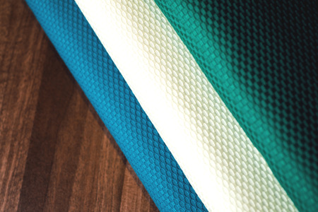 Rolls of colorful fabric as a vibrant image.の写真素材