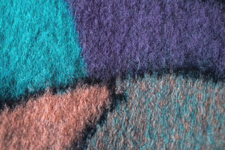 Textured fabric on wooden .