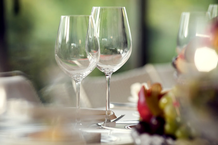 Close up picture of empty glasses in restaurant. Selective focus.の写真素材