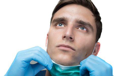 Portrait of young doctor wearing safety glases.の写真素材