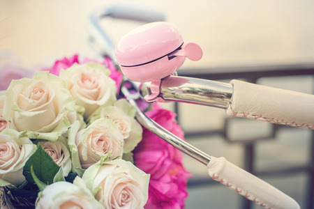 cute bicycle handlebar with a pink bell.の写真素材