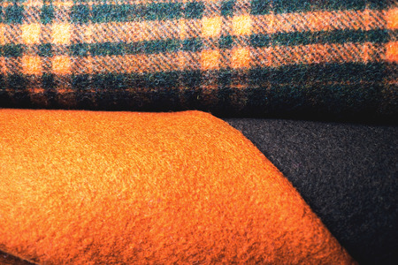 Rolls of colorful fabric as a vibrant background image.の写真素材