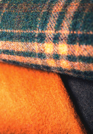 Rolls of colorful fabric as a vibrant background image.
