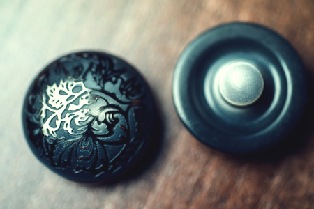 vintage buttons on wooden backgroundの写真素材