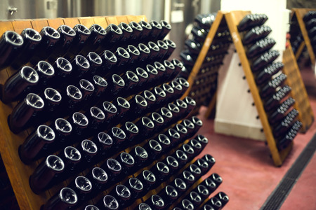 wine bottles in wine cellar.の写真素材