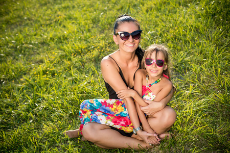 Mother and daughter in the park .の写真素材