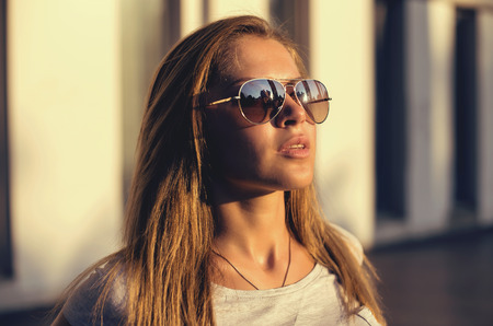 summer outdoor fashion portrait of young beautiful girl.の写真素材