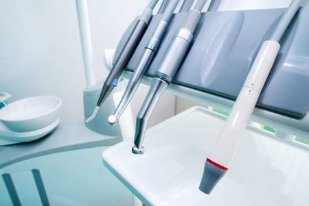 Different dental instruments and tools in a dentists office.の写真素材