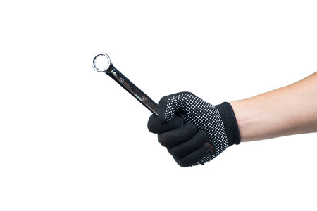 Wrench in hand workers isolate on white.の写真素材
