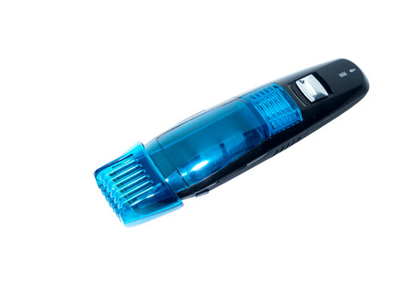 blue electric shaver closeup on white background .の写真素材
