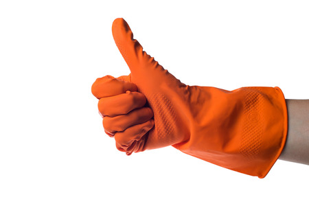 One hand in rubber glove isolated on white background.の写真素材