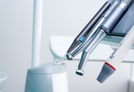 Different dental instruments and tools in a dentists office.の写真素材